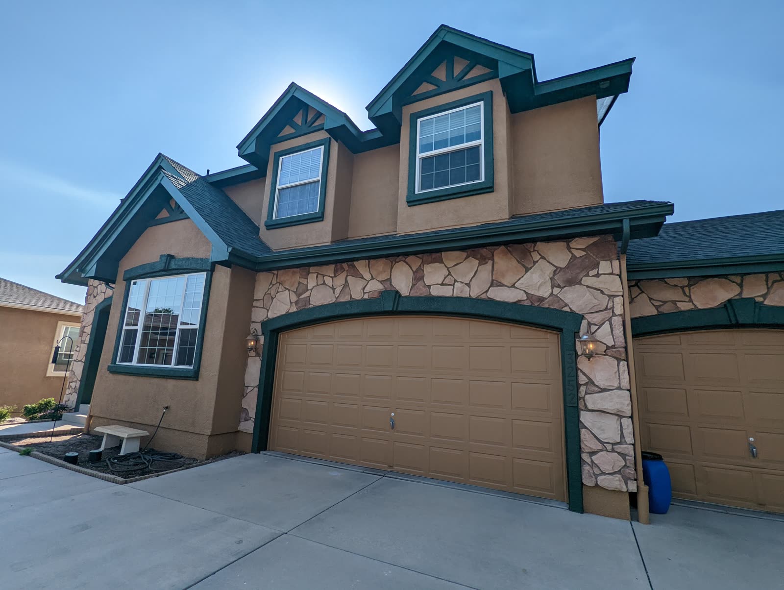 Exterior house painting on a Colorado Springs home